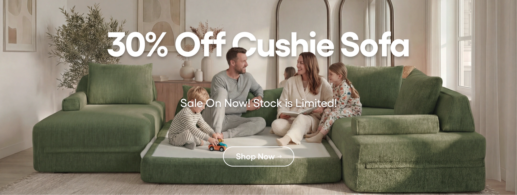 Family sitting on a green couch with promotional text overlay