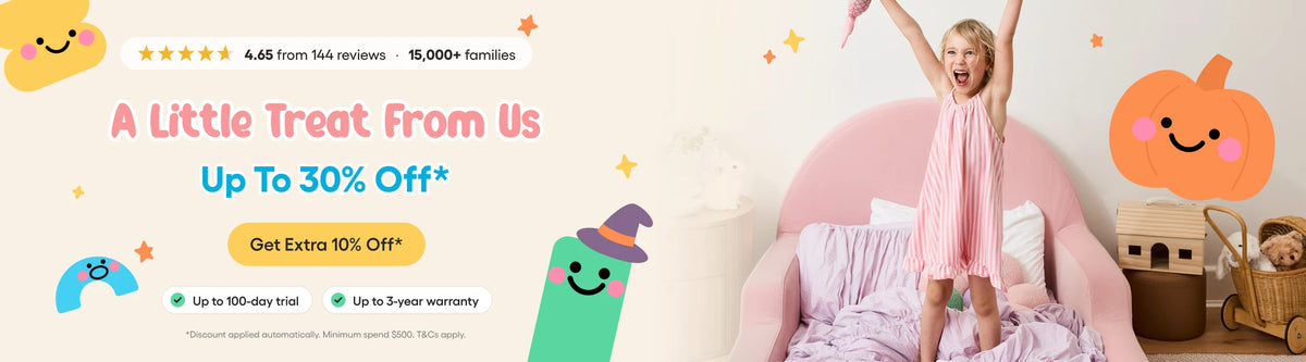 A promotional banner for a children's pink plush chair, featuring a young girl in a pink dress standing on the chair with her arms raised. The chair is decorated with a pink bow and a purple bow tie.